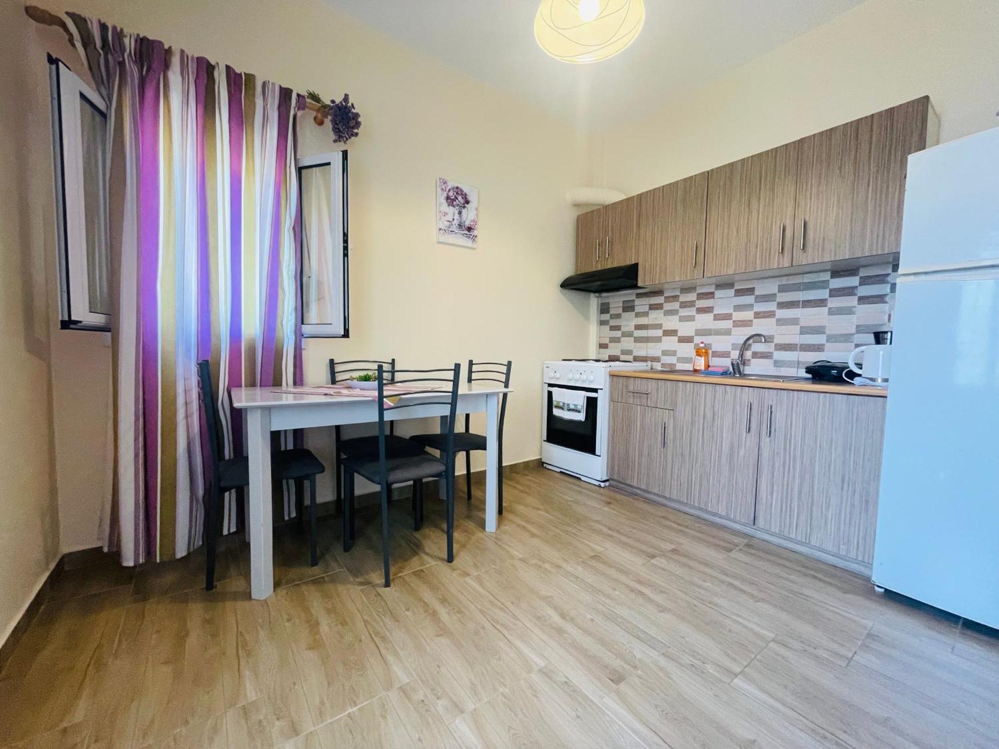 Fergani Apartments Moudhros ภายนอก รูปภาพ