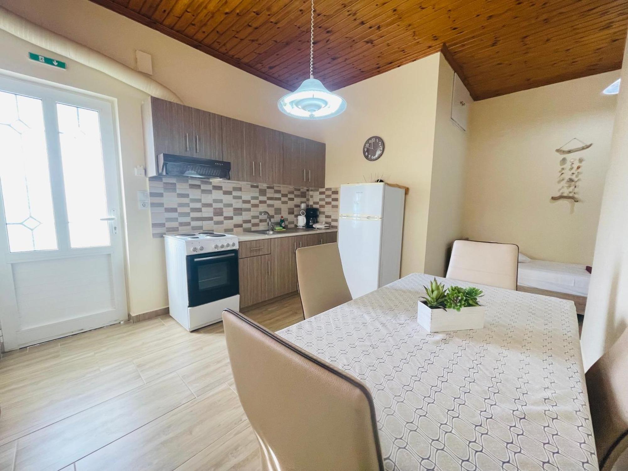 Fergani Apartments Moudhros ภายนอก รูปภาพ